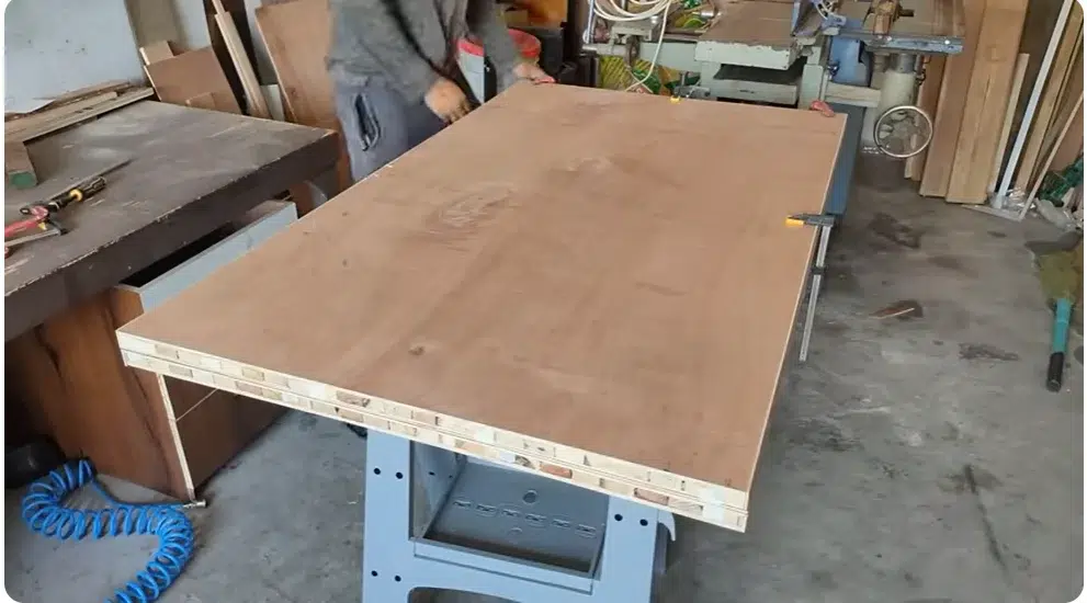 Carpenter installing wooden door in Dubai home by Royalsons