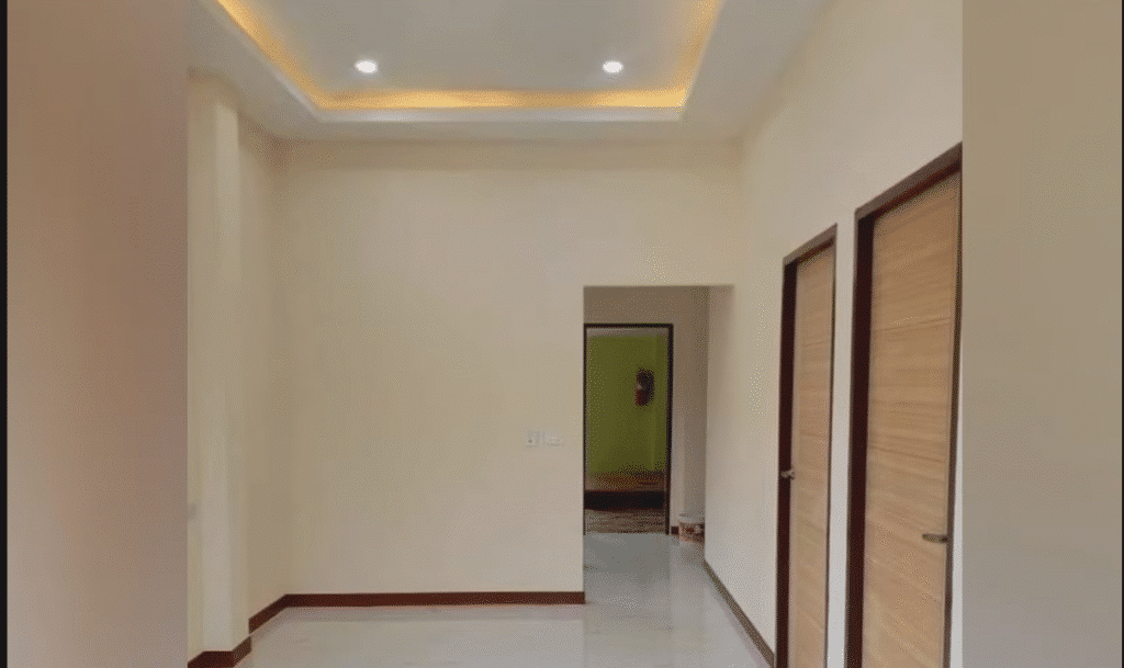 Finished hallway with bright neutral paint.