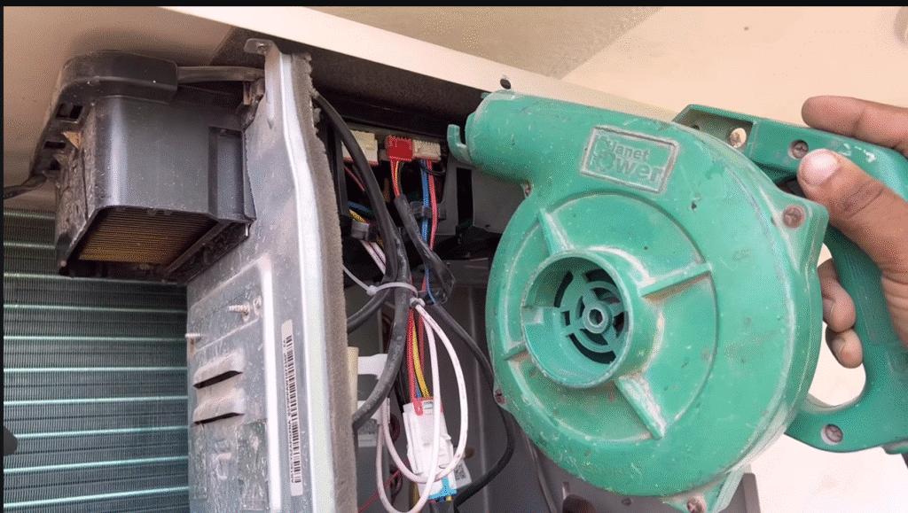 Team repairing industrial air conditioning system.