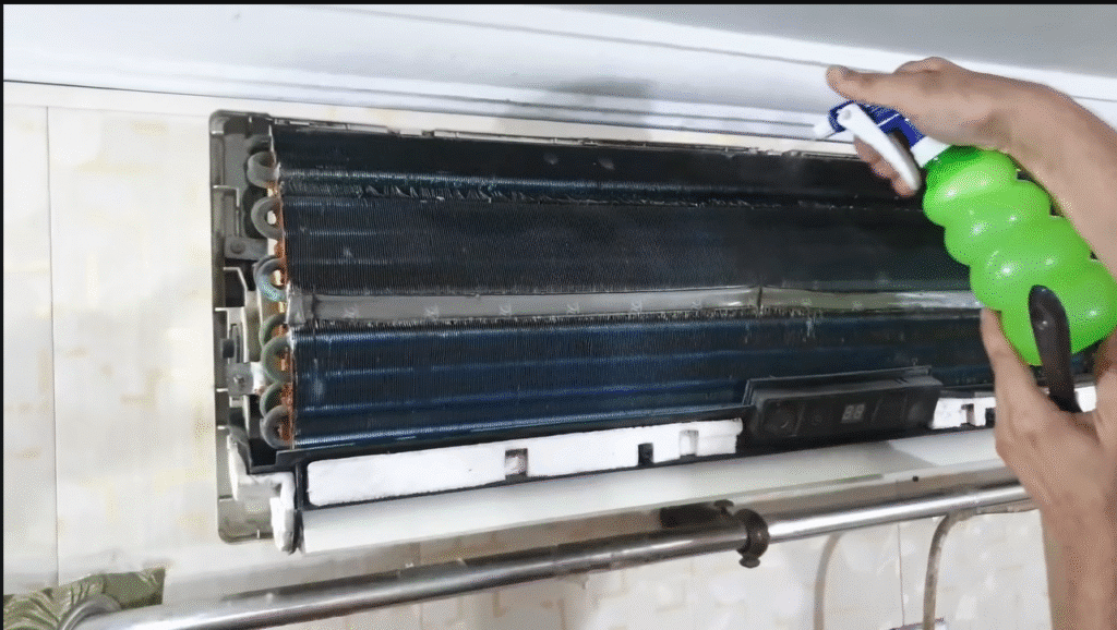 HVAC technician fixing thermostat control.