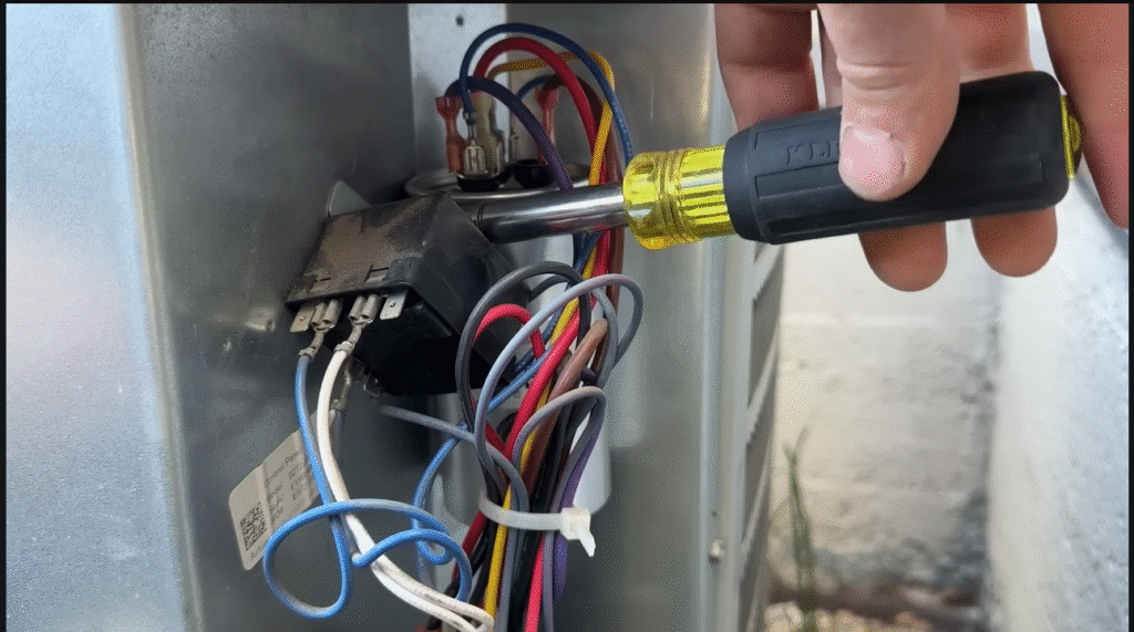 Air conditioning expert checking refrigerant gas level.