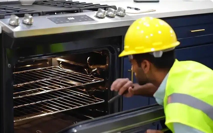 Electrician conducting an electrical safety inspection in Dubai