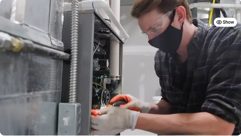 Electrician setting up garden lights outside a Dubai villa