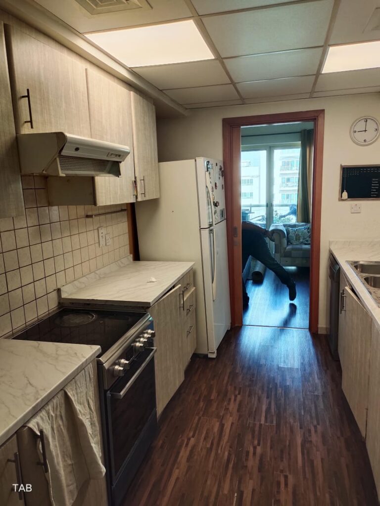 Modern white kitchen with marble countertops