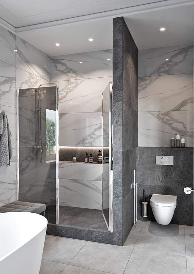 Neutral-toned washroom design with white and beige tiles