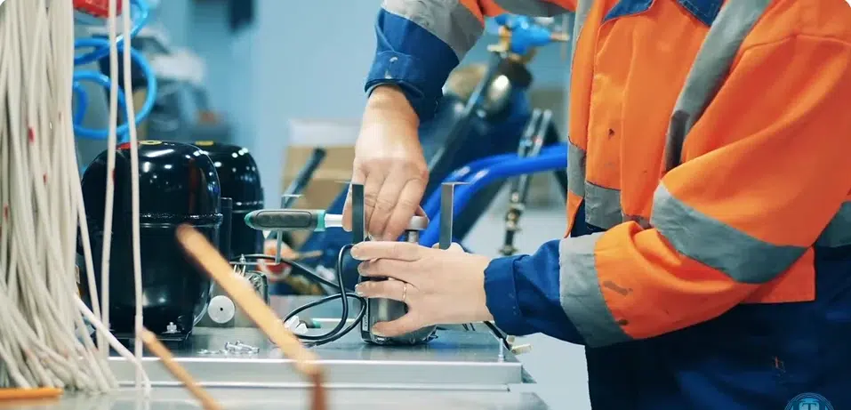 Electrician installing new wiring in a Dubai apartment